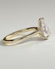 Courtney - Pear Claw Solitaire with Hidden Halo, Tapered Band and Cathedral High Setting Engagement Ring - 18k Yellow Gold