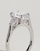 Davina - Emerald Claw Trilogy with Pear Side Stones and Cathedral Setting Engagement Ring - 18k White Gold