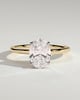 Erica - Oval Claw Solitaire with Petal Gallery, Accent Leaf Detail and Cathedral Setting Engagement Ring - 18k Yellow Gold / 18k White Gold