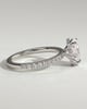 Oval 4 Claw Solitaire with Wrap Around Hidden Halo and Pave Band Engagement Ring - 18k White Gold