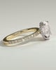 Oval 4 Claw Solitaire with Wrap Around Hidden Halo and Pave Band Engagement Ring - 18k Yellow Gold / 18k White Gold