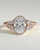 Oval Bezel Solitaire with Clustered Round-Marquise Mixed Set Shoulder Stones Engagement Ring - 18k Rose Gold