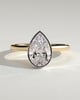 Jude - Pear Bezel Solitaire with Hidden Halo and Cathedral High Setting Engagement Ring - 18k Yellow Gold / 18k White Gold