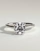 Laura - Round Claw Solitaire with Hidden Halo, Tapered Band and Cathedral High Setting Engagement Ring - 18k White Gold