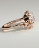 Lorena - Round Claw Solitaire with Bypass Band and Clustered Round-Marquise Accent Stones Engagement Ring - 18k Rose Gold