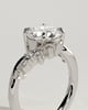 Lorena - Round Claw Solitaire with Bypass Band and Clustered Round-Marquise Accent Stones Engagement Ring - 18k White Gold