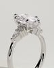 Loretta - Marquise 6 Claw Solitaire with Pear Accents and Round Shoulder Stones Engagement Ring - 18k White Gold High Setting
