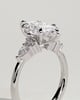 Loretta - Marquise Claw Solitaire with Pear Accents and Round Shoulder Stones Engagement Ring - 18k White Gold High Setting