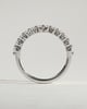 Lucy - Round Shared Prong Accent Stone Wedding Ring - 18k White Gold