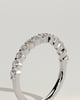 Lucy - Round Shared Prong Accent Stone Wedding Ring - 18k White Gold