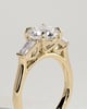 Marina - Round Claw Trilogy with Tapered Baguette Side Stones and Cathedral Setting Engagement Ring - 18k Yellow Gold