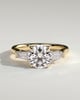 Marina - Round Claw Trilogy with Tapered Baguette Side Stones and Cathedral Setting Engagement Ring - 18k Yellow Gold