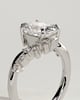 Merida - Elongated Cushion 4 Claw Solitaire with Bypass Band and Clustered Round-Marquise Accent Stones Engagement Ring - 18k White Gold