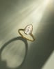 Paris - Pear Solitaire with Cathedral Bezel Setting Lifestyle Image