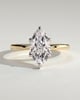 Robin - Marquise Claw Solitaire with Petal Gallery and Accent Leaf Detail Engagement Ring - 18k Yellow Gold / 18k White Gold
