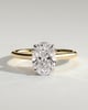 Scarlett - Oval Claw Solitaire with Hidden Halo and Cathedral High Setting Engagement Ring - 18k Yellow Gold / 18k White Gold