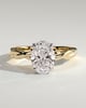 Trinity - Oval 4 Claw Solitaire with Twisted Band Engagement Ring - 18k Yellow Gold / 18k White Gold