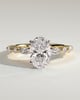 Alyssa - Oval Claw Solitaire with Marquise and Round Accent Stones Engagement Ring - 18k Yellow Gold / 18k White Gold