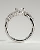 Ezmerelda - Oval Claw Solitaire with Bypass Band and Clustered Round-Marquise Accent Stones Engagement Ring - 18k White Gold