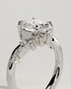 Ezmerelda - Oval Claw Solitaire with Bypass Band and Clustered Round-Marquise Accent Stones Engagement Ring - 18k White Gold
