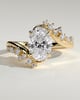 Ezmerelda - Oval Claw Solitaire with Bypass Band and Clustered Round-Marquise Accent Stones Engagement Ring - 18k Yellow Gold