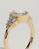 Isabella - Oval Bezel Solitaire with Clustered Round-Marquise Mixed Set Shoulder Stones Engagement Ring - 18k Yellow Gold