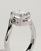 Kala - Oval Claw Solitaire with Bypass Band Engagement Ring - 18k White Gold