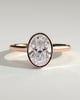 Sierra - Oval Bezel Solitaire with Hidden Halo and Cathedral High Setting Engagement Ring - 18k Rose Gold