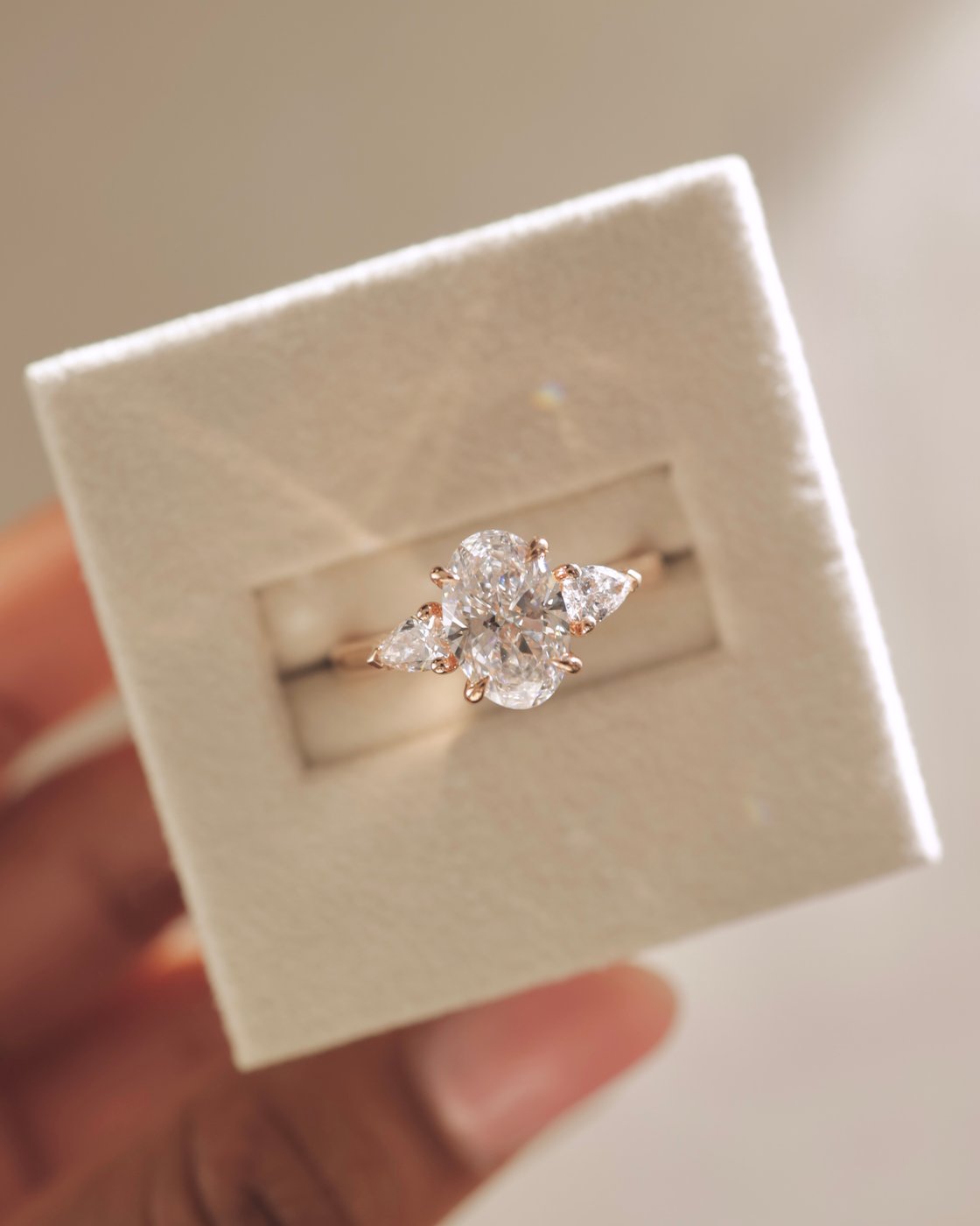 Alexia - Oval Claw Trilogy with Pear Side Stones and Cathedral