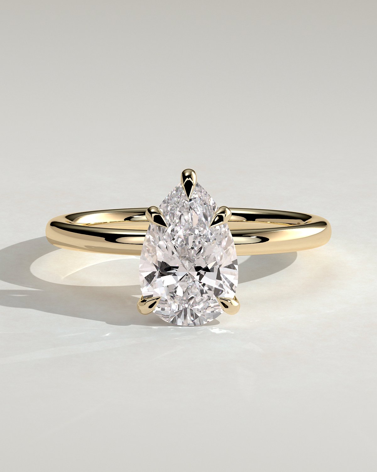Alia - 5 Claw Pear Solitaire - 18k Yellow Gold