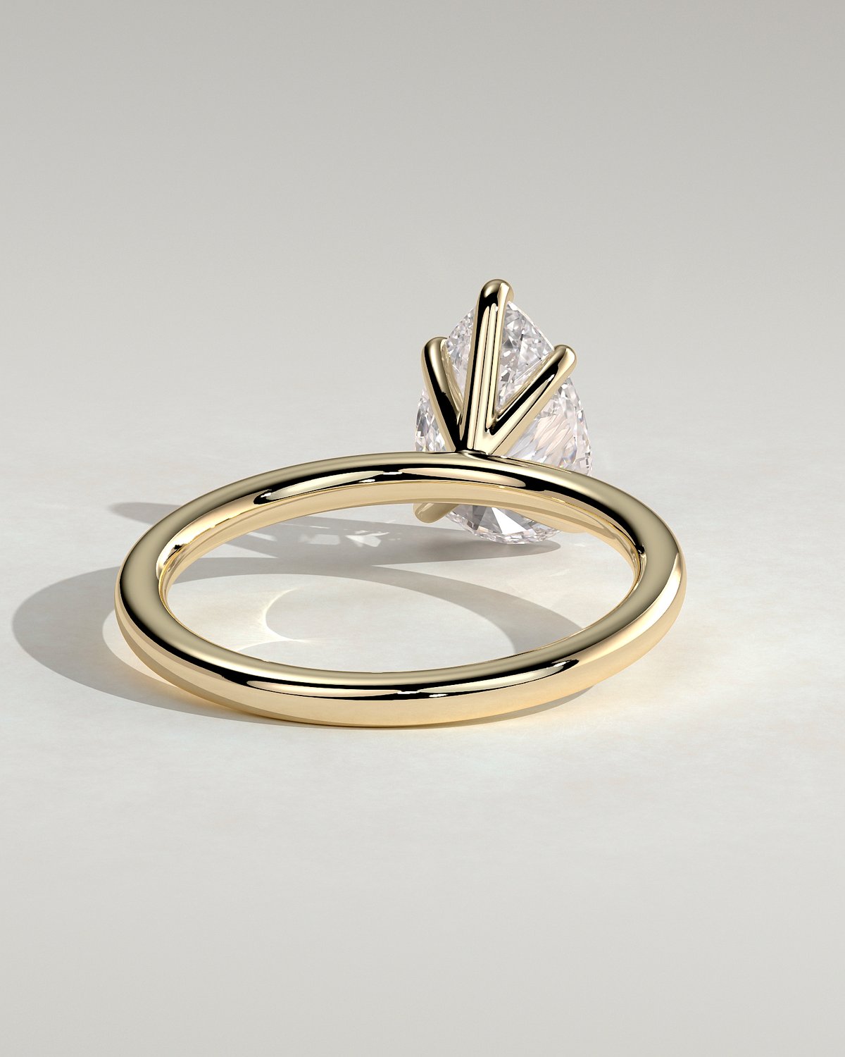 Alia - 5 Claw Pear Solitaire - 18k Yellow Gold