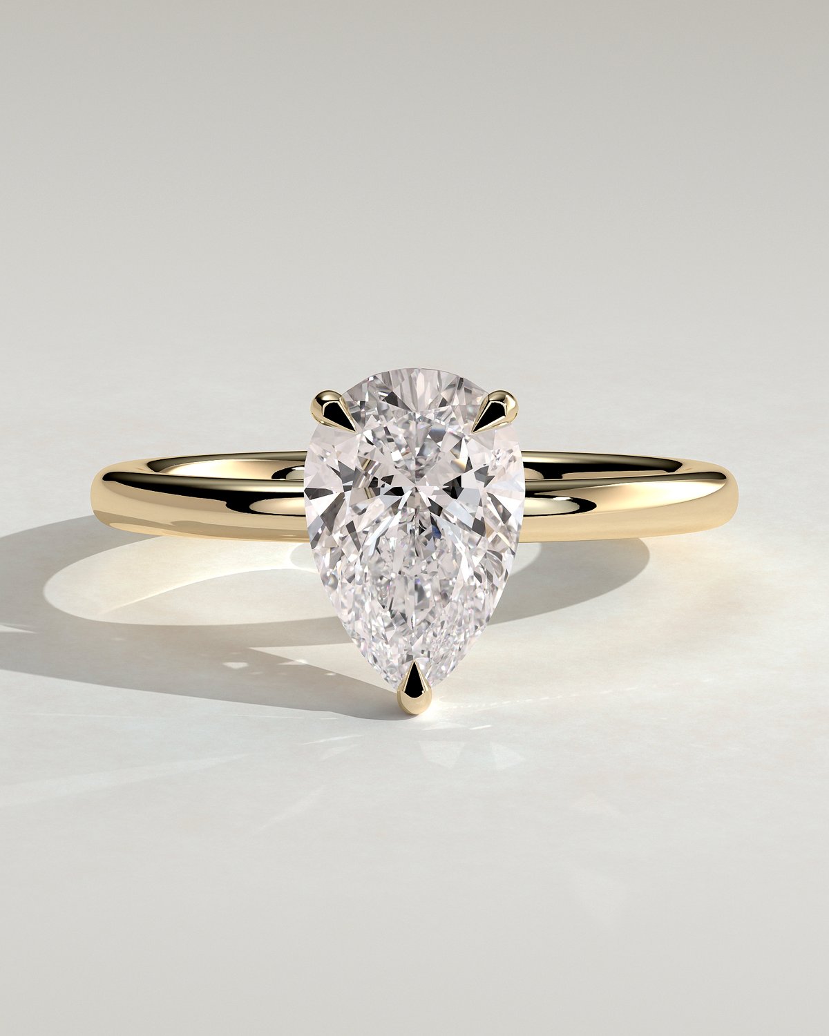 Amy  3 Claw Pear Solitaire - 18k Yellow Gold