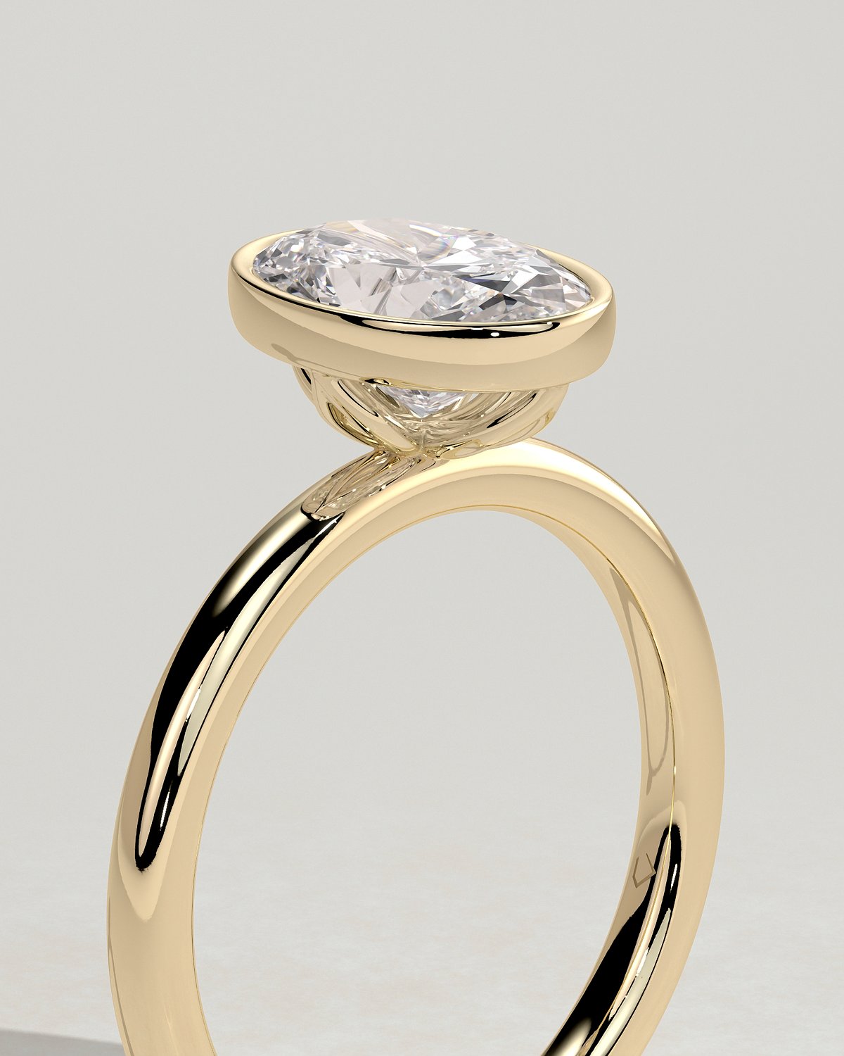 Armani - Bezel Set Oval Solitaire - 18k Yellow Gold