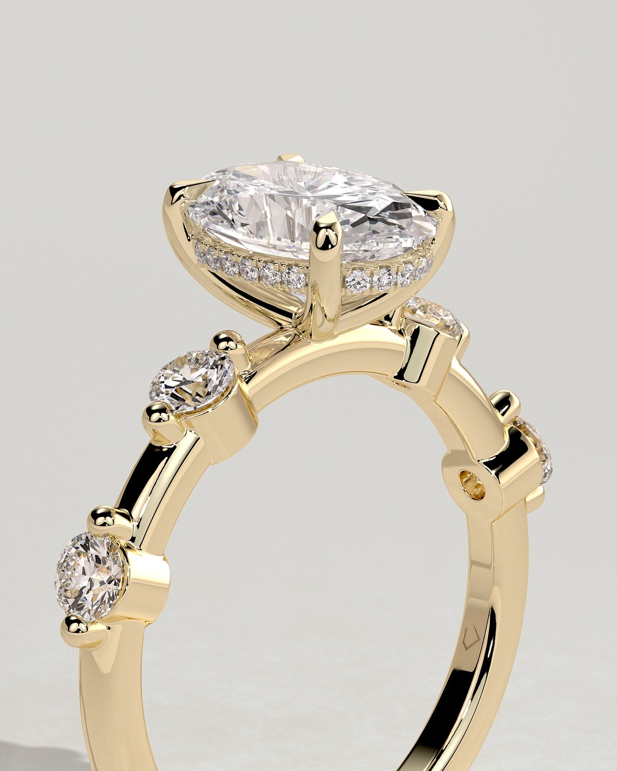 Arwen - Oval Solitaire with Hidden Halo and Accent Stones - 18k Yellow Gold