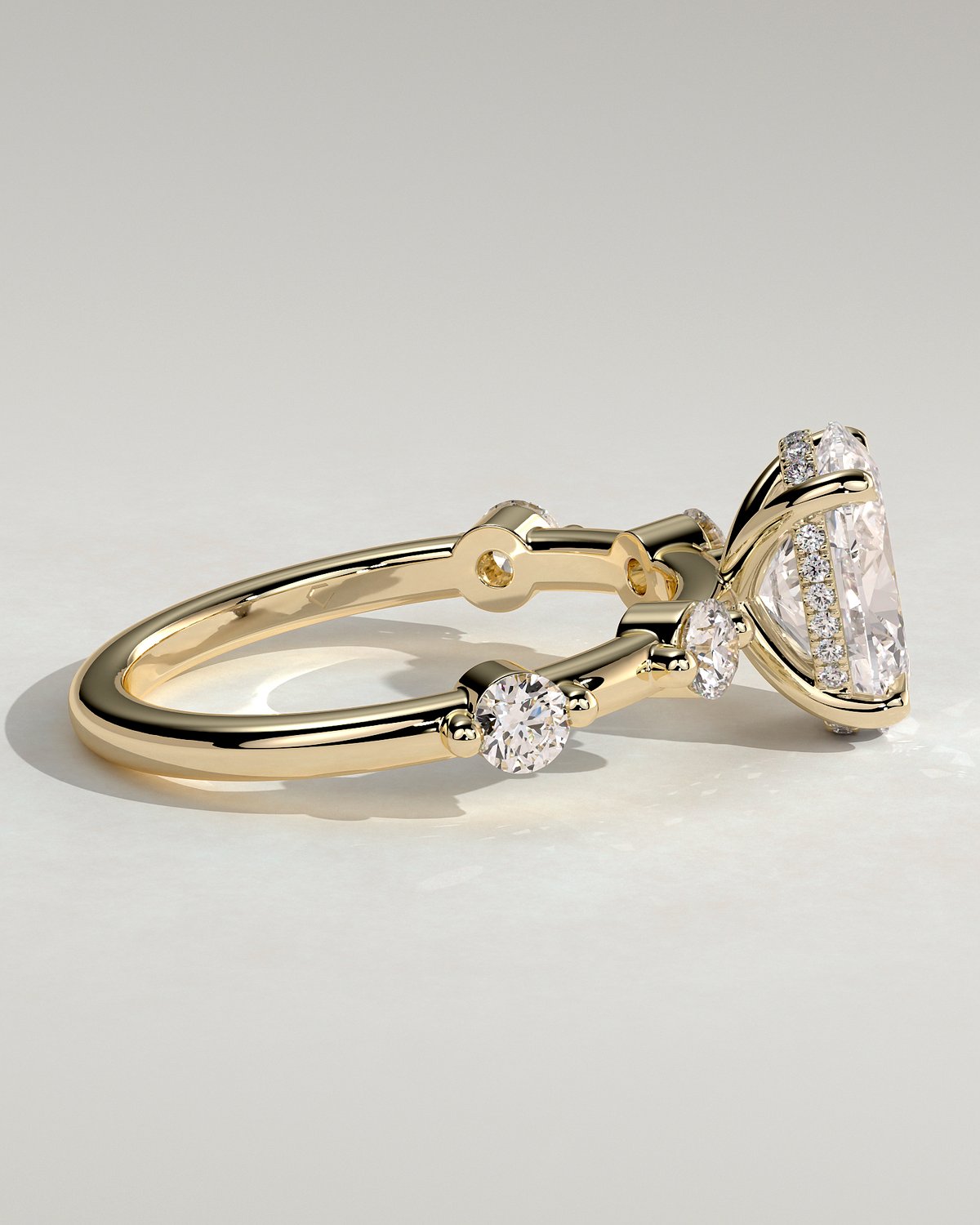 Arwen - Oval Solitaire with Hidden Halo and Accent Stones - 18k Yellow Gold