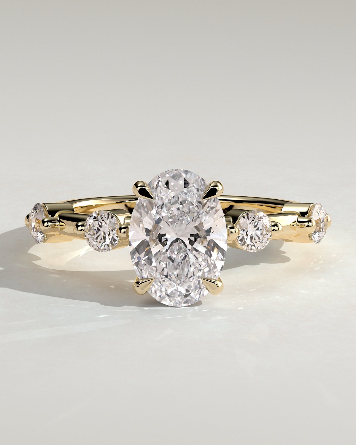 Arwen - Oval Solitaire with Hidden Halo and Accent Stones - 18k Yellow Gold