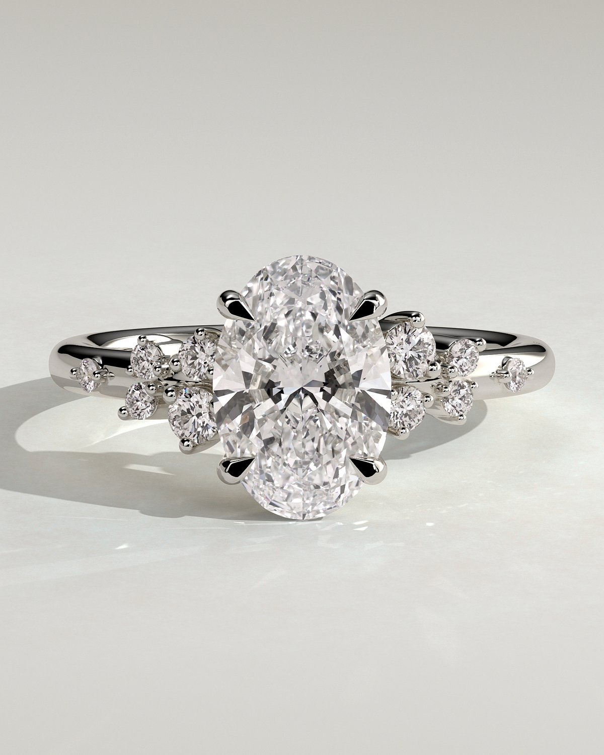 Bella  Oval Solitaire with Accent Stones - 18k White Gold
