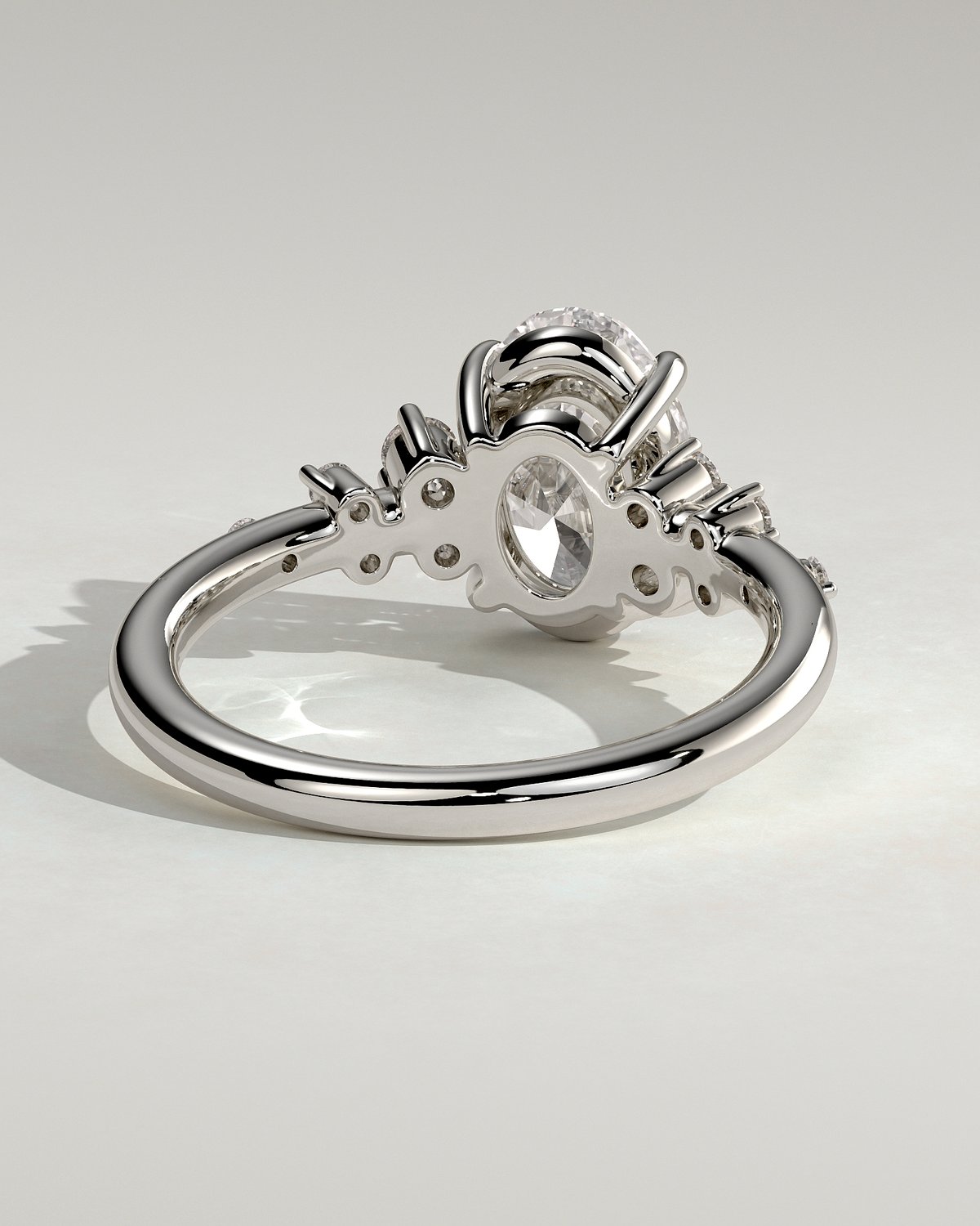 Bella  Oval Solitaire with Accent Stones - 18k White Gold