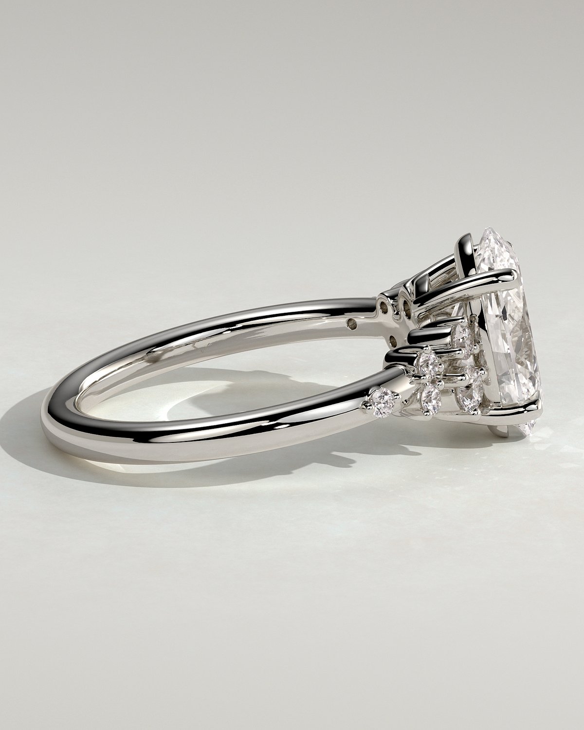 Bella  Oval Solitaire with Accent Stones - 18k White Gold
