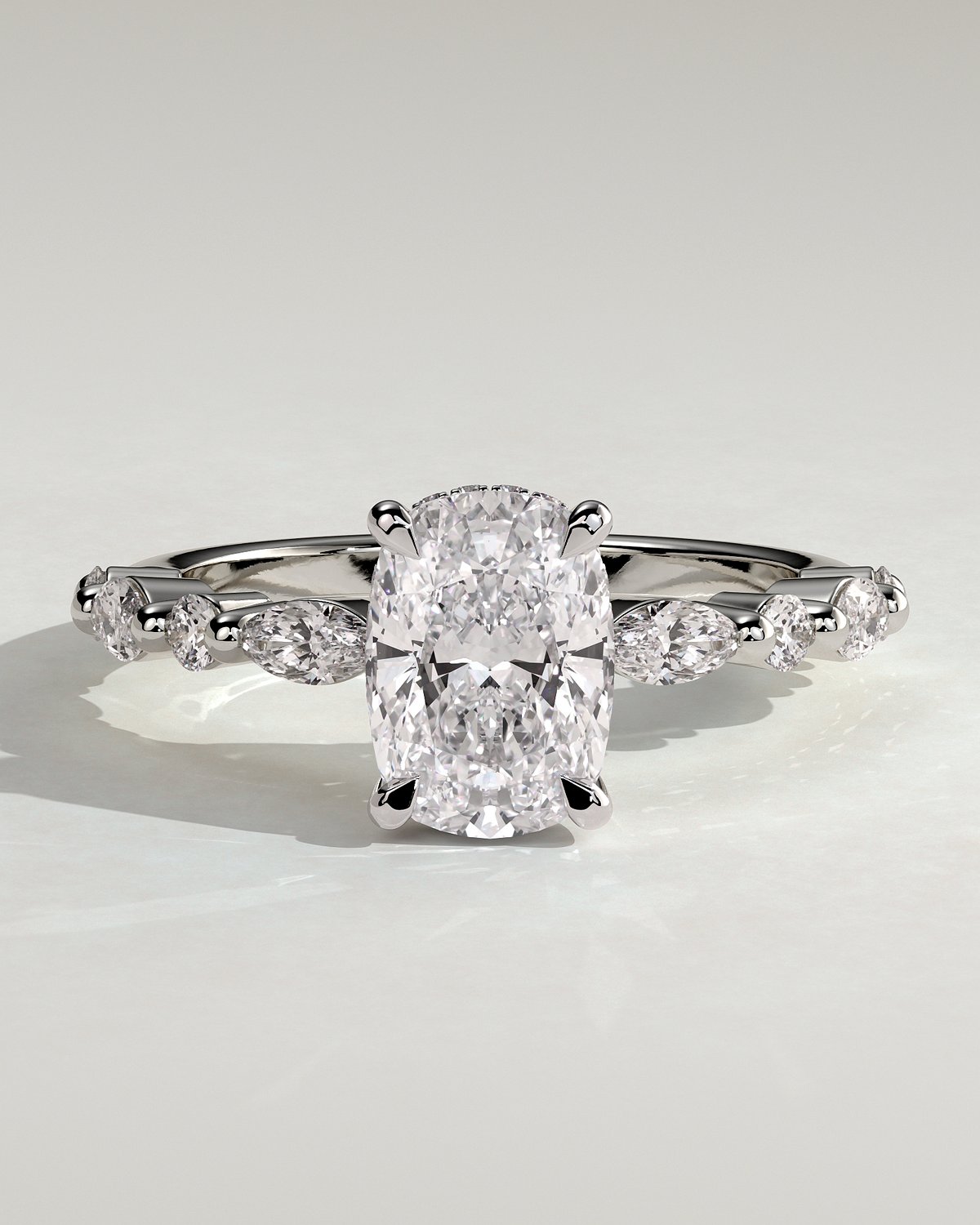 Cali - 4 Claw Elongated Cushion Solitaire with Accent Stones - 18k White Gold