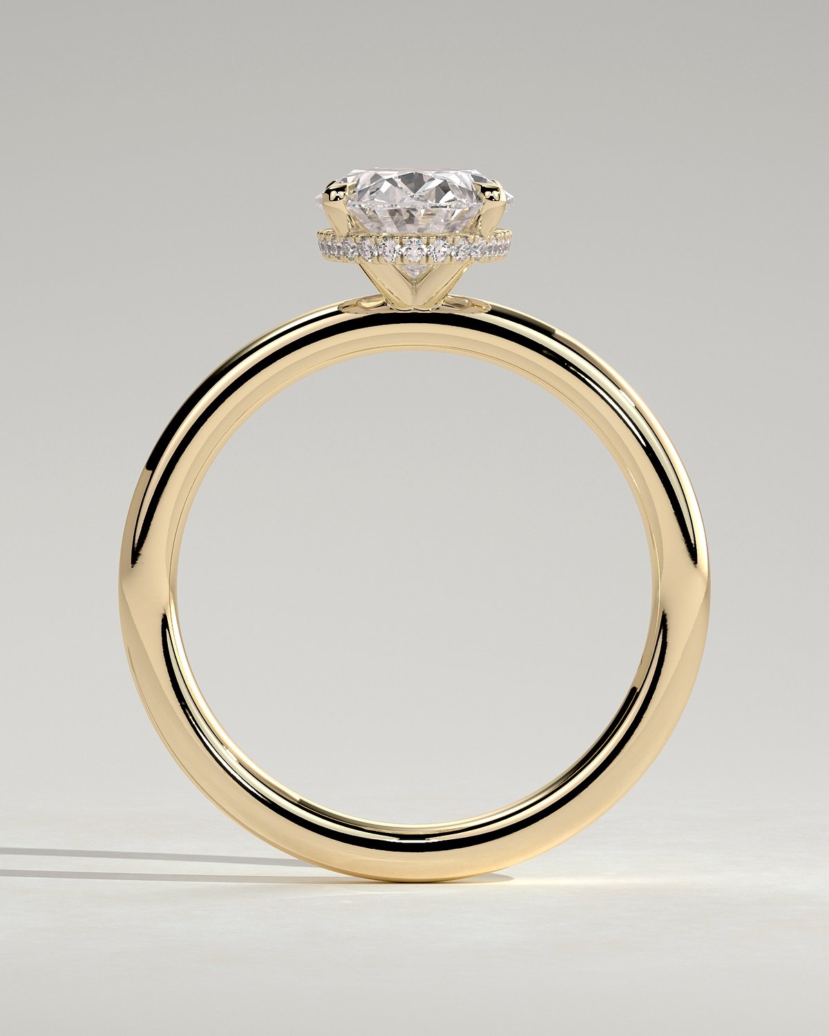 Cecilia - Oval Solitaire with Wrap Around Hidden Halo - 18k Yellow Gold