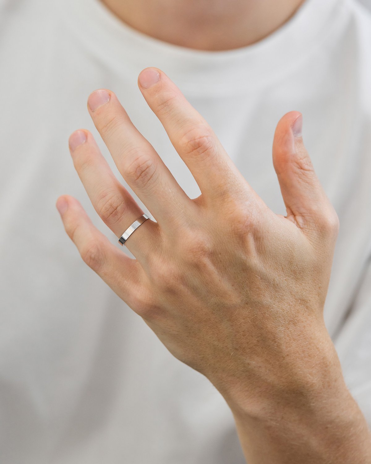 Classic Flat Mens Wedding Ring Lifestyle Image