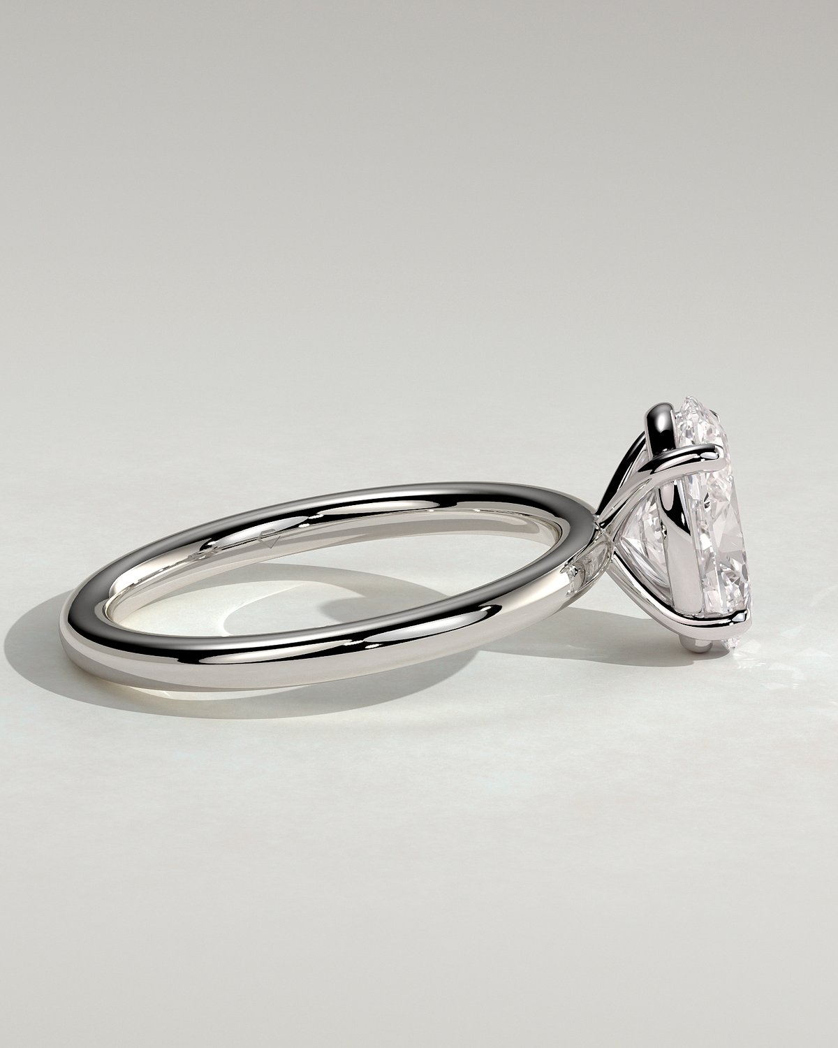 Daisy  Oval Solitaire - 18k White Gold High Setting