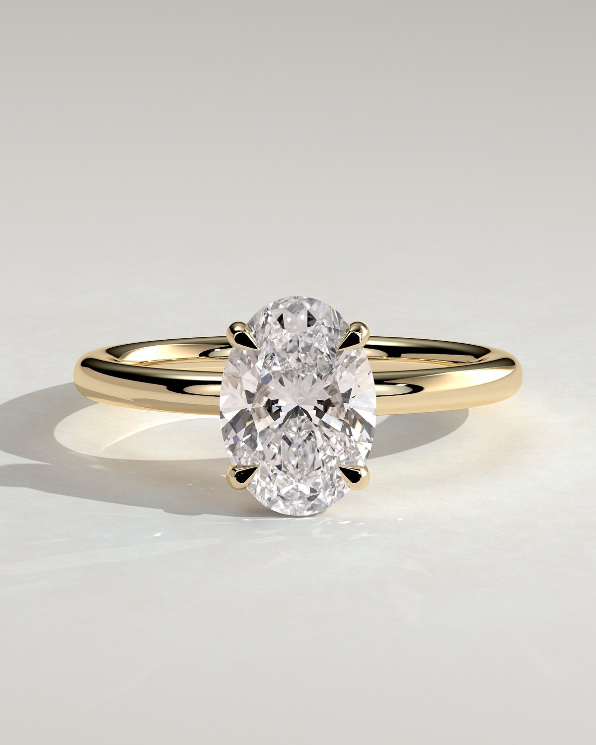 Daisy  Oval Solitaire - 18k Yellow Gold High Setting