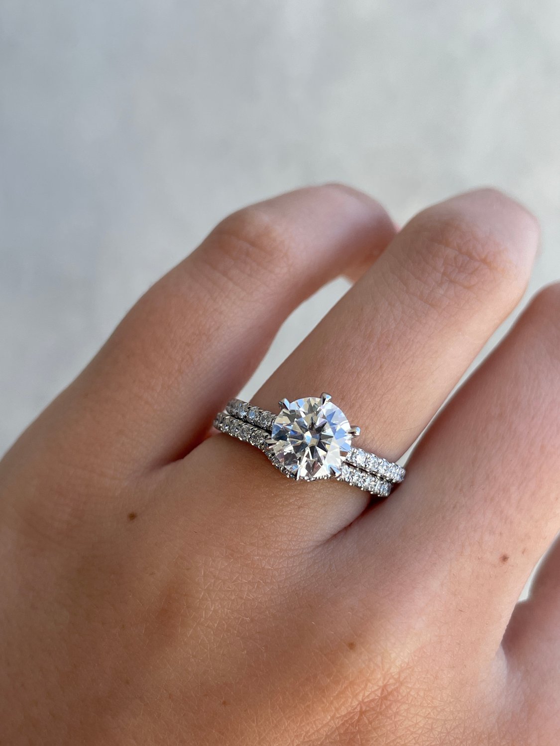 Demi  2/3 Pave Curved Wedding Ring Lifestyle Image