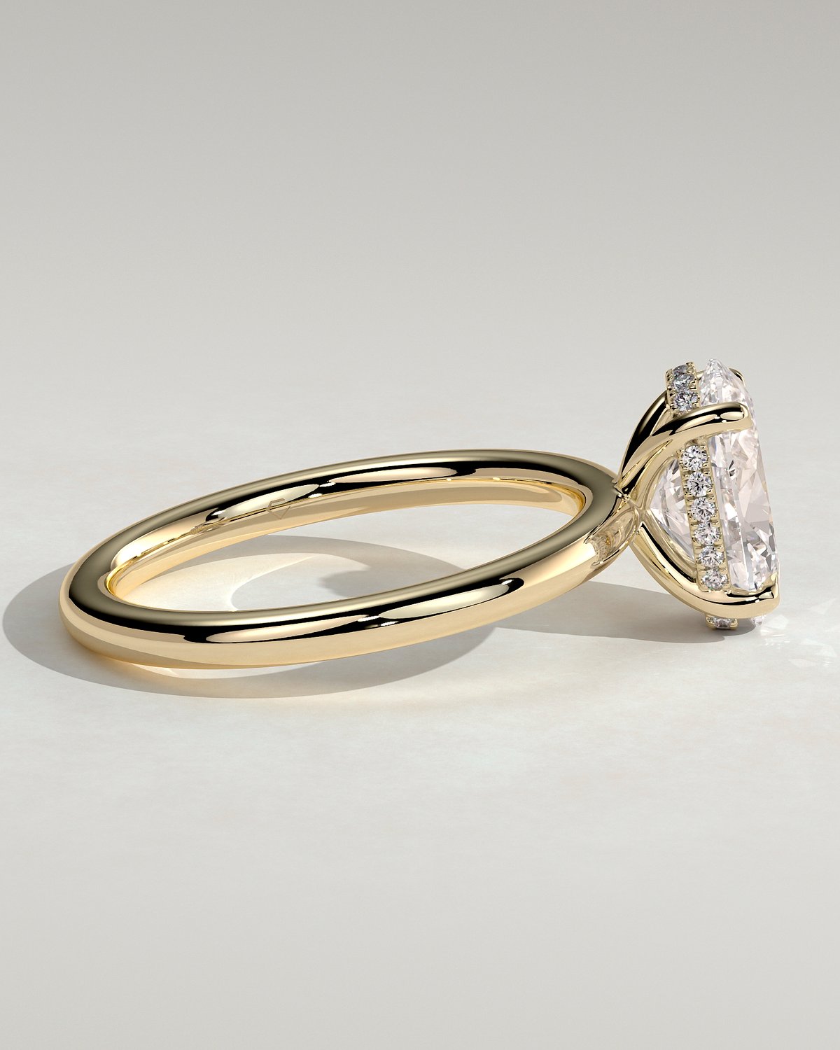 Emma  Oval Solitaire with Hidden Halo - 18k Yellow Gold High Setting