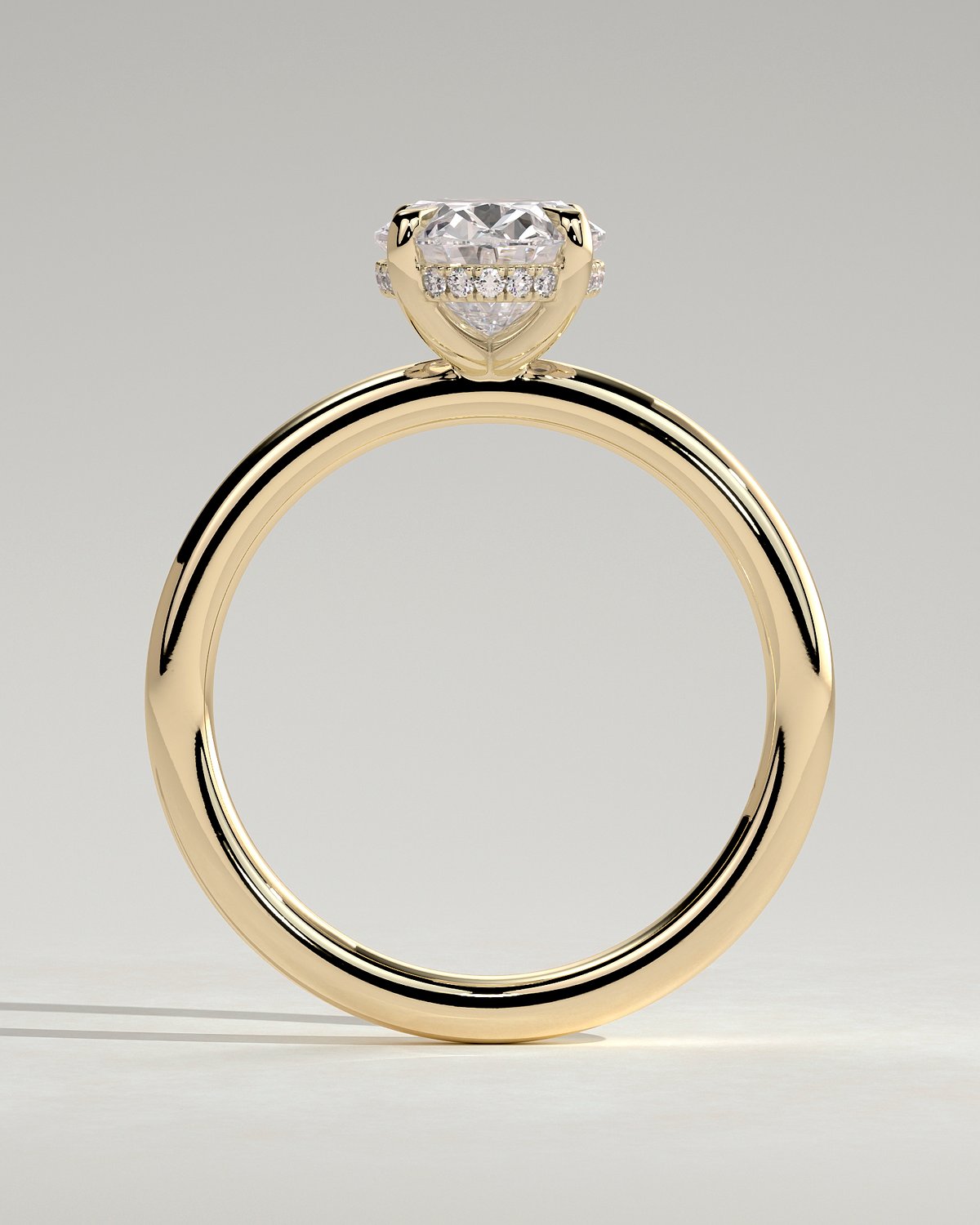 Emma  Oval Solitaire with Hidden Halo - 18k Yellow Gold High Setting