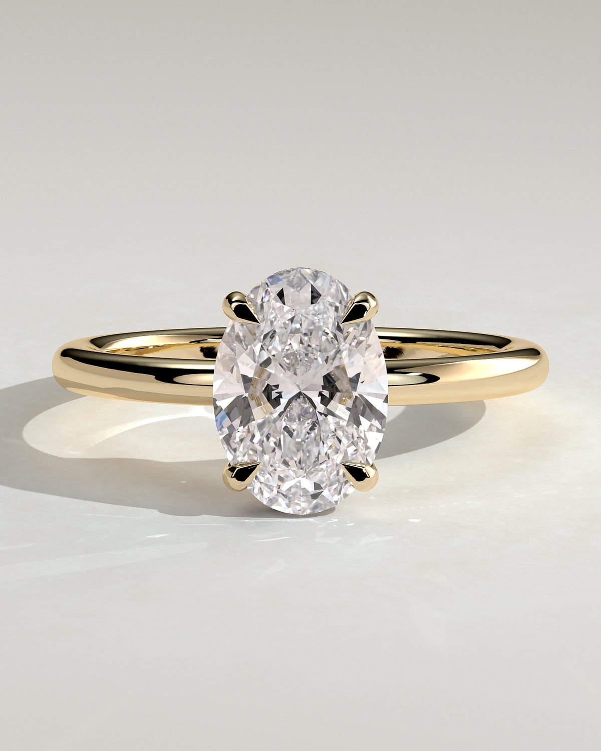 Emma  Oval Solitaire with Hidden Halo - 18k Yellow Gold Low Setting