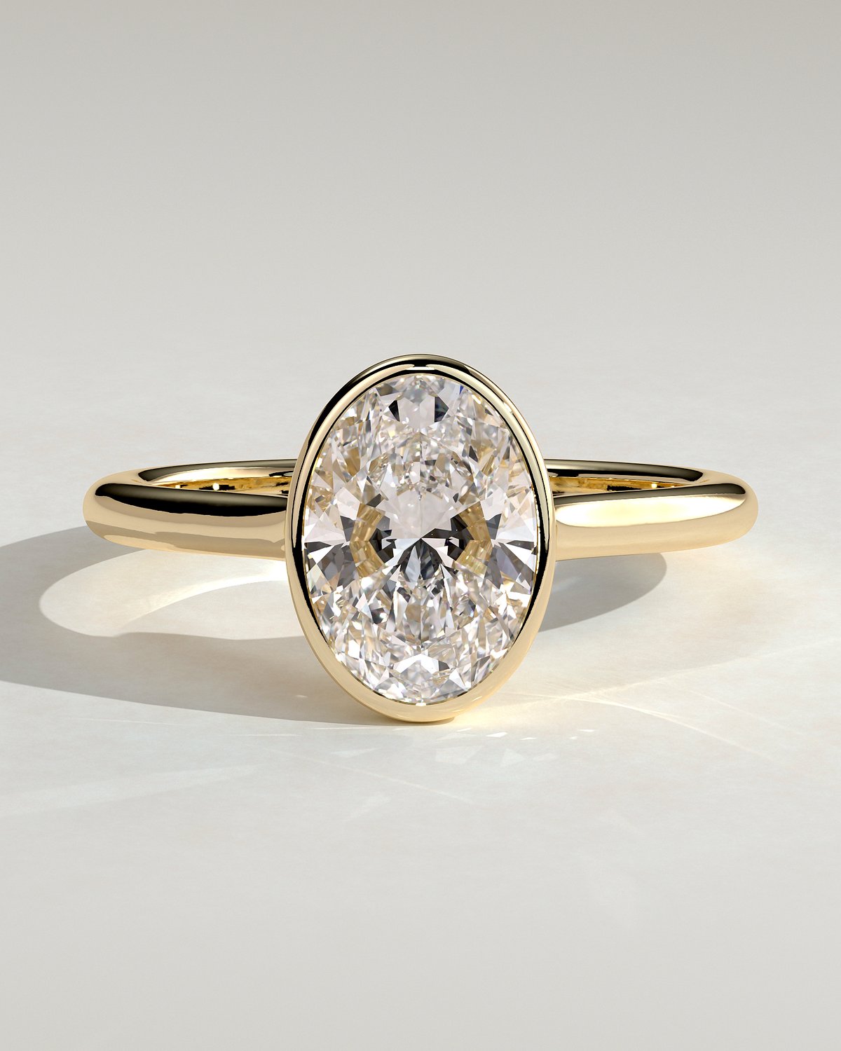 Gemma  Bezel Set Oval Solitaire - 18k Yellow Gold