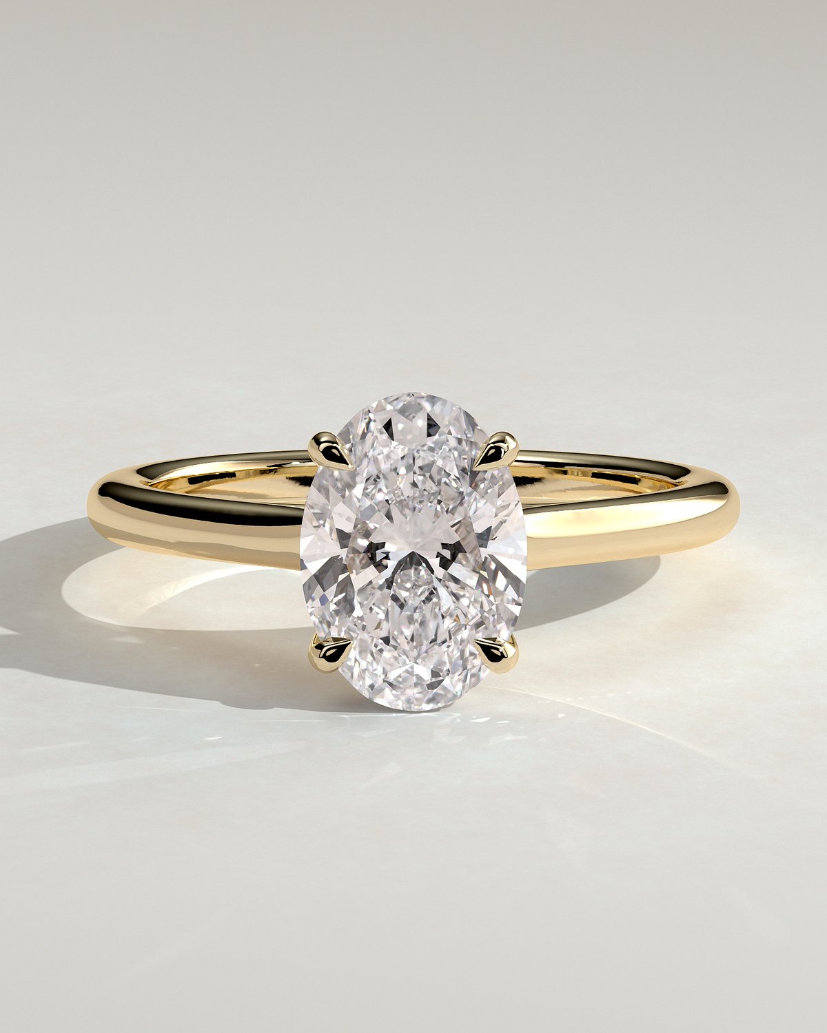 Hilary - 4 Claw Oval Solitaire - 18k Yellow Gold